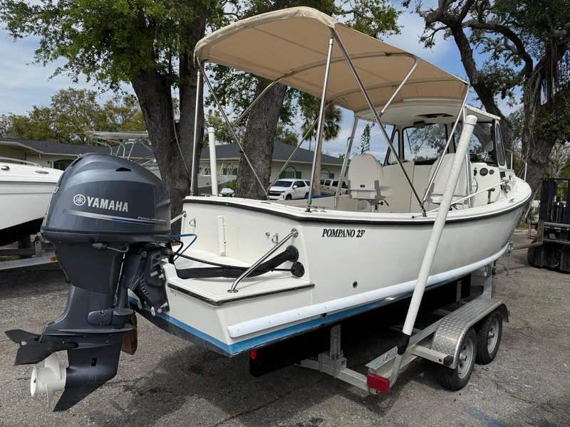 Slide: The Image of 2015 Atlas Boat Works Pompano 23 on trailer with Yamaha outboard motor. - 6