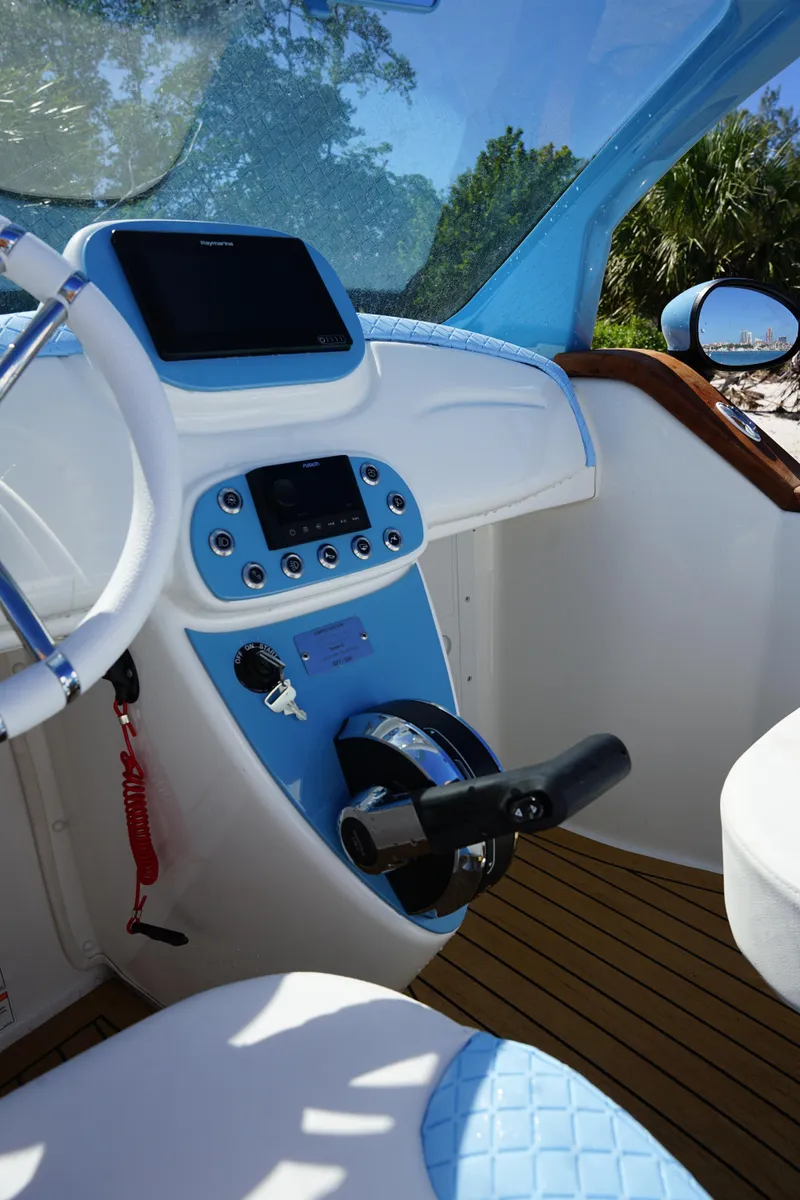 Slide: The Image of Interior of a 2025 Car Off-shore Fiat 500 Classic, featuring a modern dashboard and controls. - 11