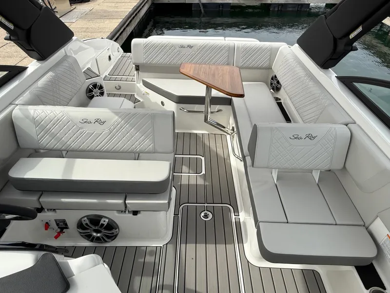 Slide: The Image of 2025 Sea Ray SDX 250 boat interior with luxurious seating and sleek design. - 6