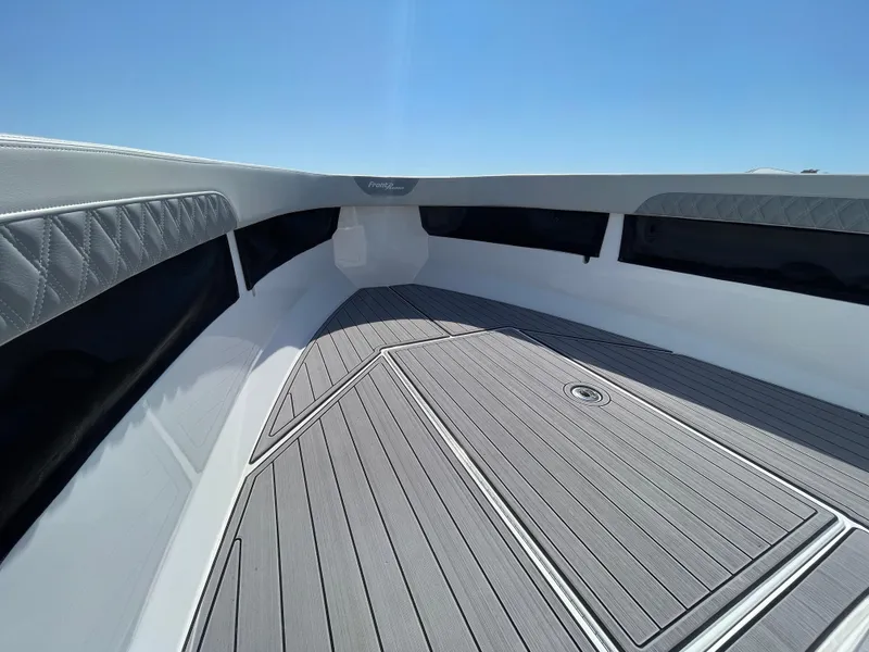 Slide: The Image of 2023 Front Runner 26 Center Console boat interior with sleek deck design. - 18