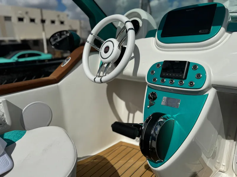 Slide: The Image of Interior of 2025 Car Off-shore Fiat 500 Classic, featuring modern dashboard and steering wheel. - 19