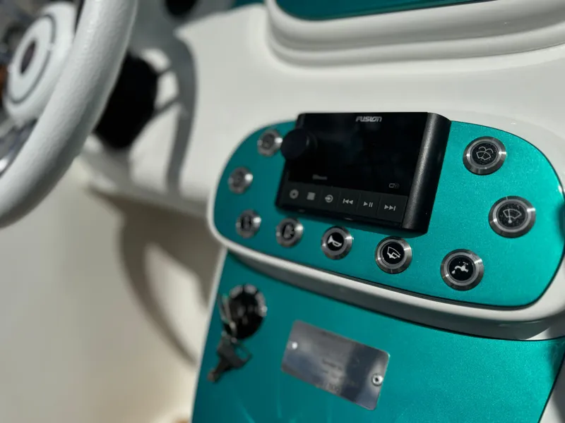 Slide: The Image of Dashboard of 2025 Car Off-shore Fiat 500 Classic with modern controls. - 27