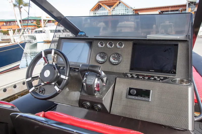 Slide: The Image of Control panel of 2023 Novielli Veloche 349 boat with modern navigation instruments. - 10