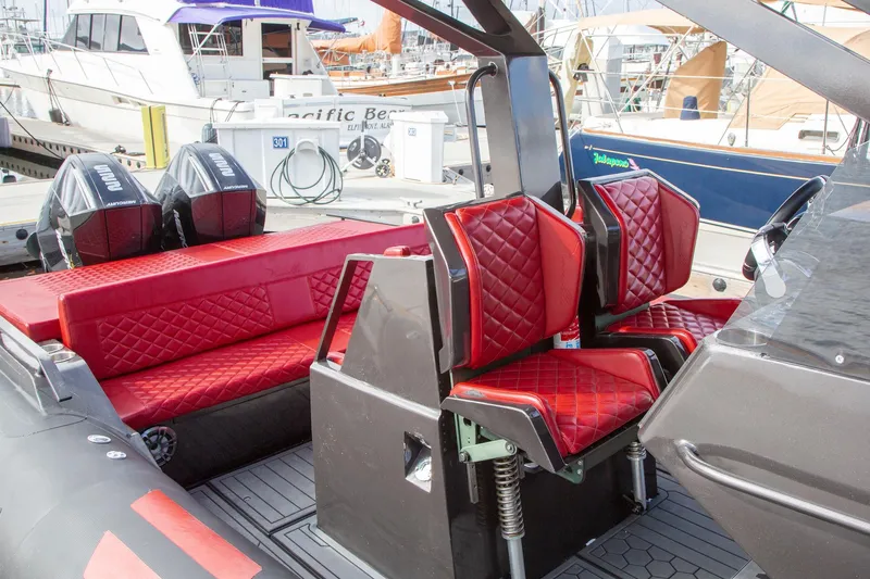 Slide: The Image of Luxury Novielli Veloche 349 boat interior with red quilted seats, 2023 model. - 8