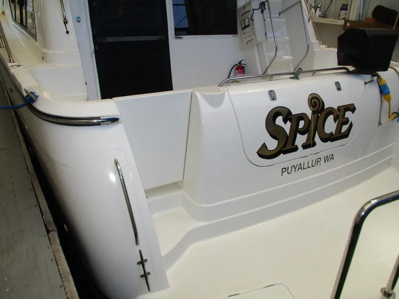 Slide: The Image of Bayliner 5288 Pilot House 2000, named "Spice," docked in Puyallup, WA. - 18