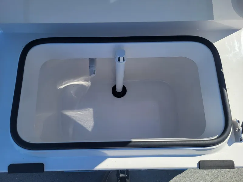 Slide: The Image of Livewell compartment of 2025 Vexus ACX 2000 boat, featuring a sleek design. - 16