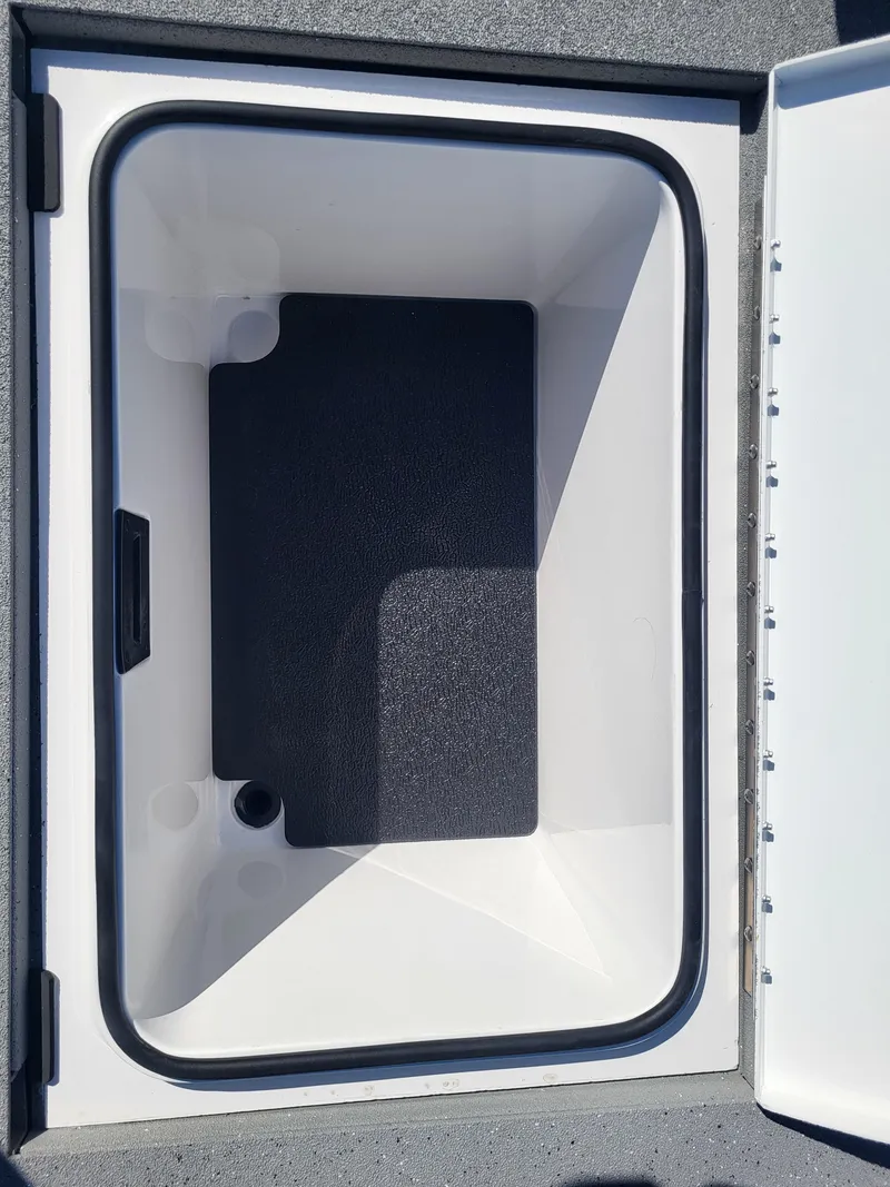 Slide: The Image of Open storage compartment of 2025 Vexus ACX 2000 boat, featuring a spacious interior. - 20