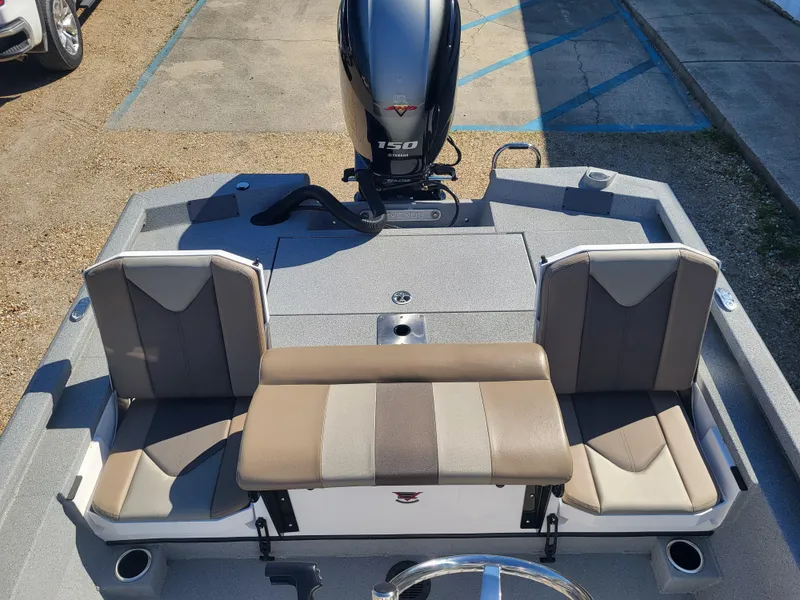 Slide: The Image of 2025 Vexus ACX 2000 boat interior with seating and 150 HP engine. - 9
