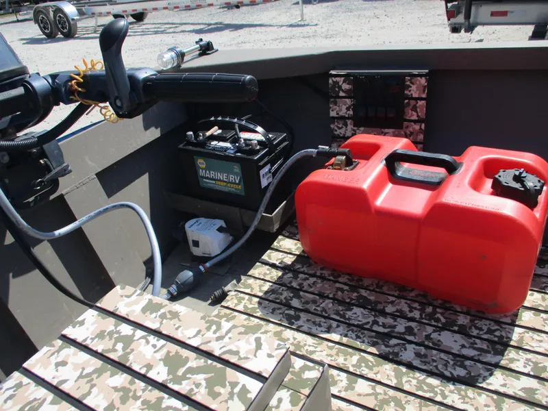 Slide: The Image of Interior of 2023 Custom 15 Aluminum boat with battery and red fuel tank. - 3
