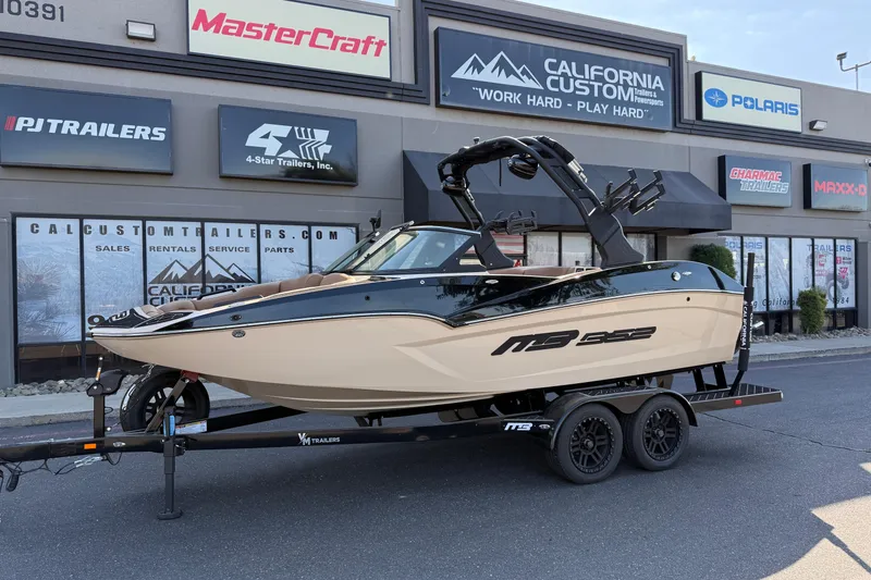 The Image of 2025 MB B52 21 Alpha boat on trailer outside California Custom Trailers store. - 0