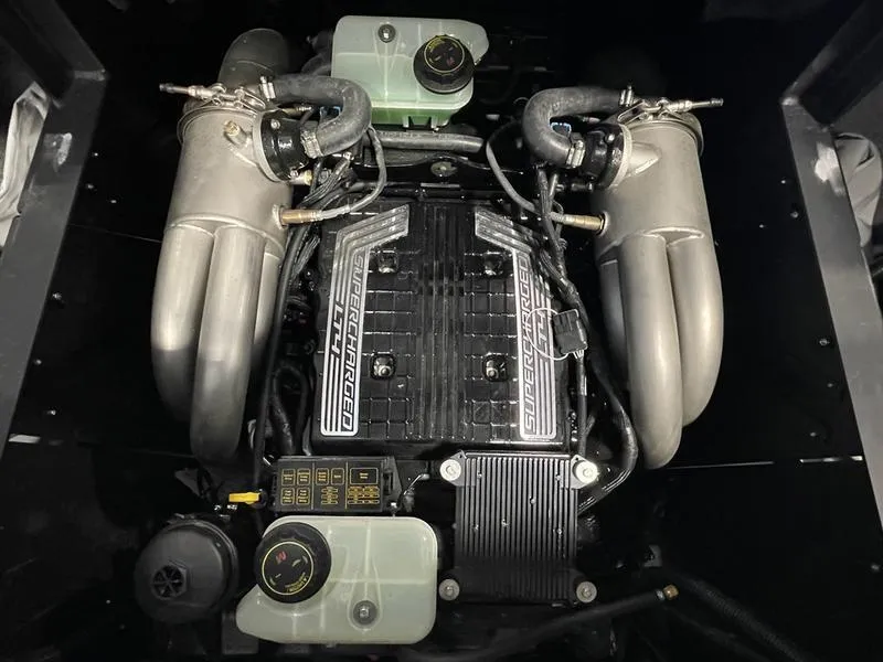Slide: The Image of 2025 Malibu M230 engine with dual intakes and visible components. - 31