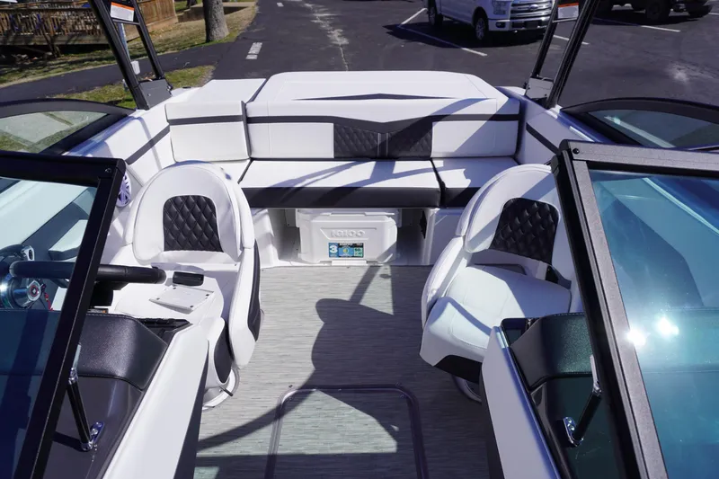 Slide: The Image of 2025 Monterey M22 boat interior with white seating and modern design. - 18