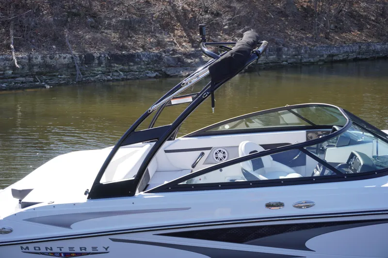 Slide: The Image of 2025 Monterey M22 boat on calm water, featuring sleek design and modern detailing. - 3