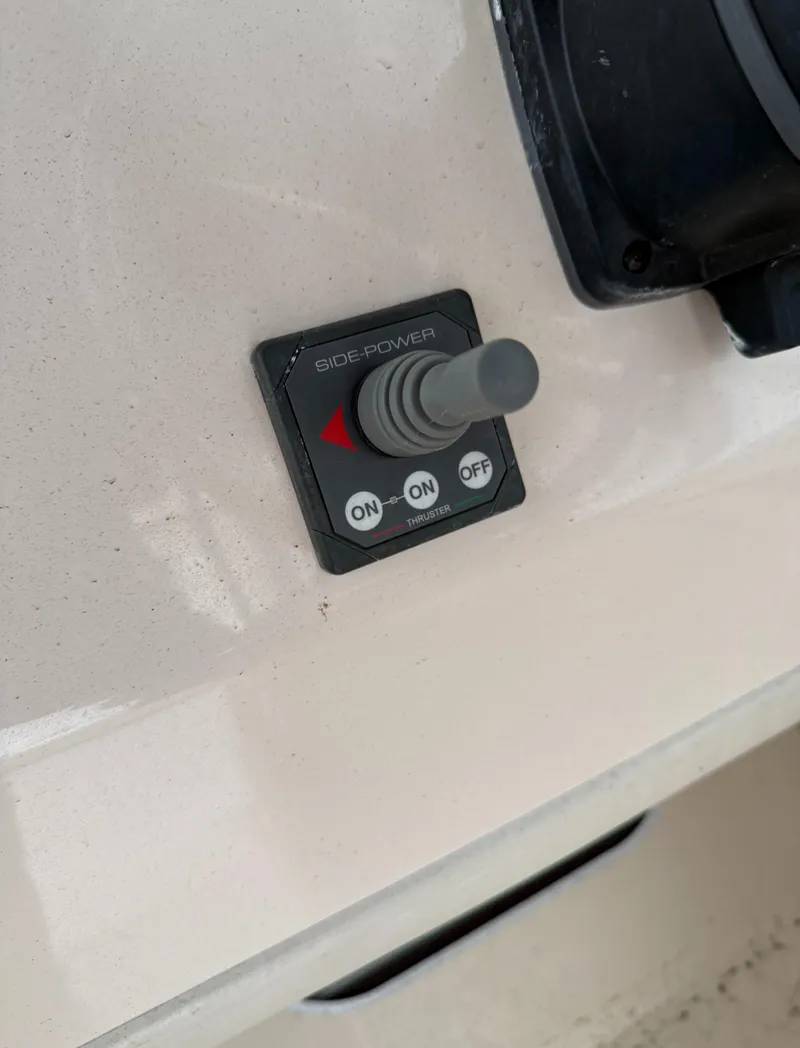 Slide: The Image of Control panel of a 2013 Grady-White Marlin 300 boat with side-power switch. - 3