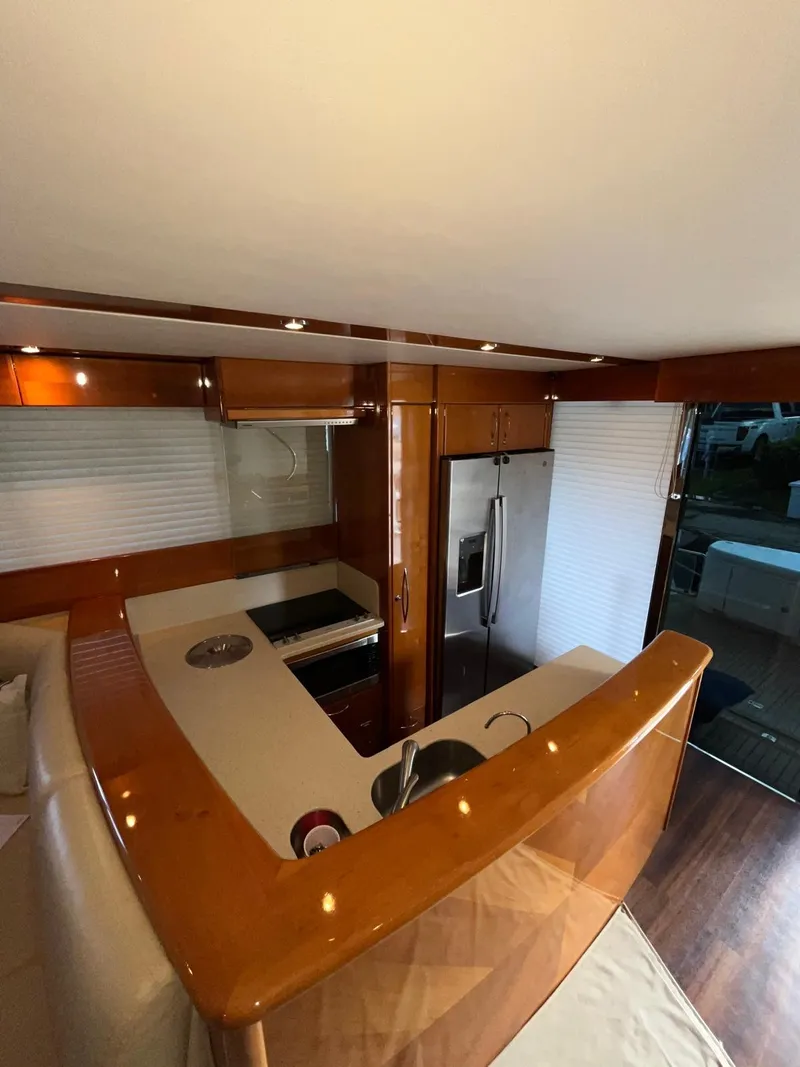 Slide: The Image of Luxurious interior of 2007 Maritimo M60 yacht with modern kitchen and sleek design. - 20