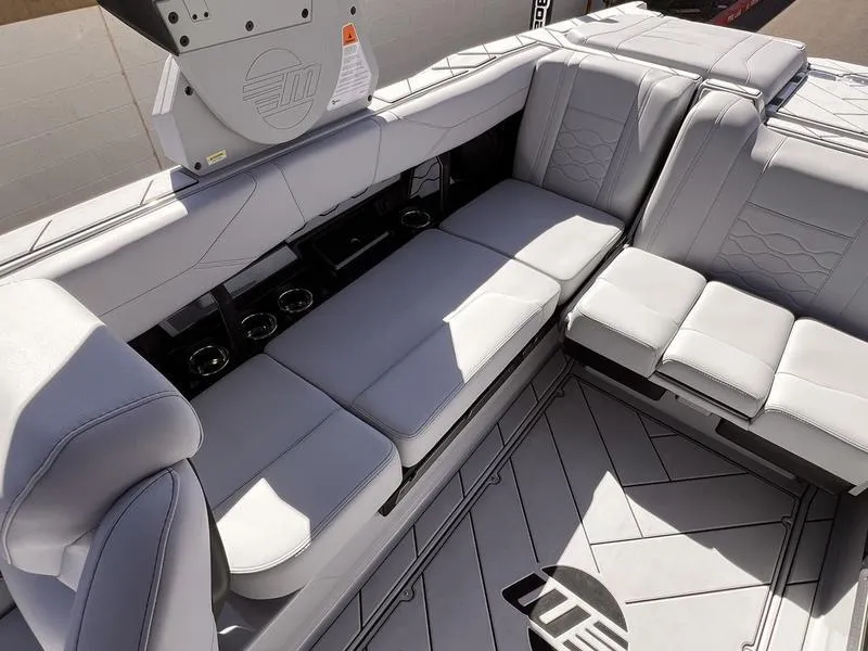 Slide: The Image of Luxurious seating in 2025 Malibu 23 LSV boat, featuring sleek, modern design and premium upholstery. - 19