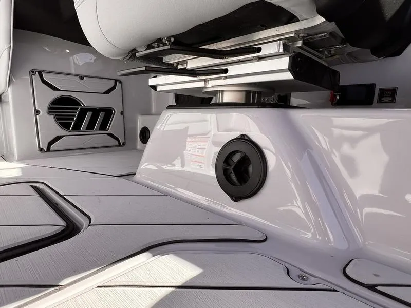Slide: The Image of Interior of 2025 Malibu 23 LSV boat showcasing sleek design and modern features. - 20
