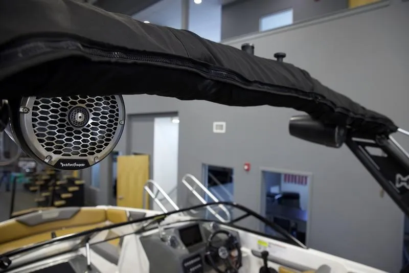 Slide: The Image of 2023 Heyday WTSurf boat interior with speaker and dashboard details. - 10