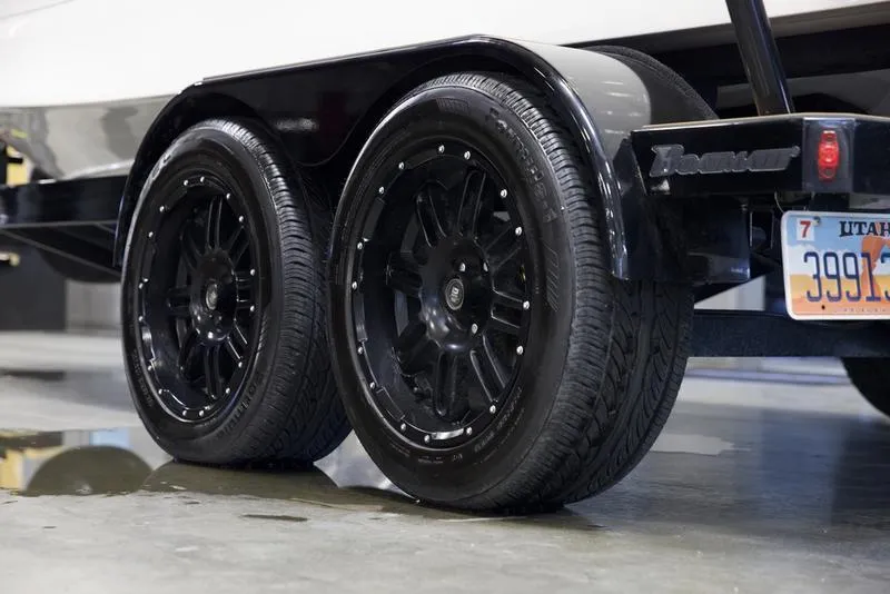 Slide: The Image of 2023 Heyday WTSurf trailer with black wheels and Utah license plate. - 6