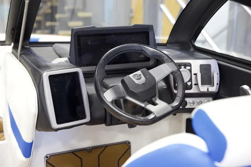 Slide: The Image of 2024 Malibu 23 LSV dashboard with modern steering wheel and digital displays. - 15