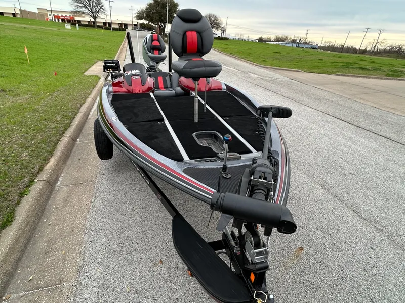Slide: The Image of 2008 Ranger Z21 fishing boat on trailer, parked on roadside. - 10