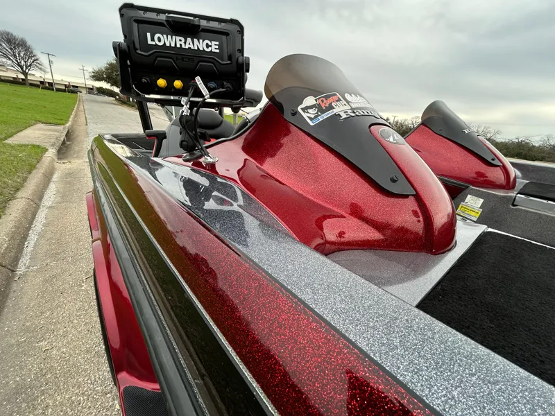 Slide: The Image of 2008 Ranger Z21 boat with Lowrance equipment, featuring a red and silver glitter finish. - 18