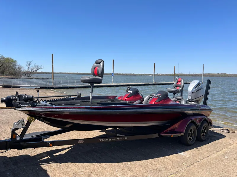 Slide: The Image of Garmin display stand with three GPS devices, showcasing navigation and mapping features. - 5