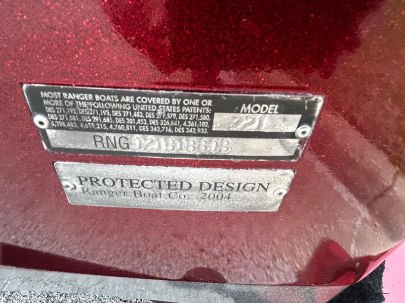 Slide: The Image of 2008 Ranger Z21 boat model plate with patent information and protected design label. - 50