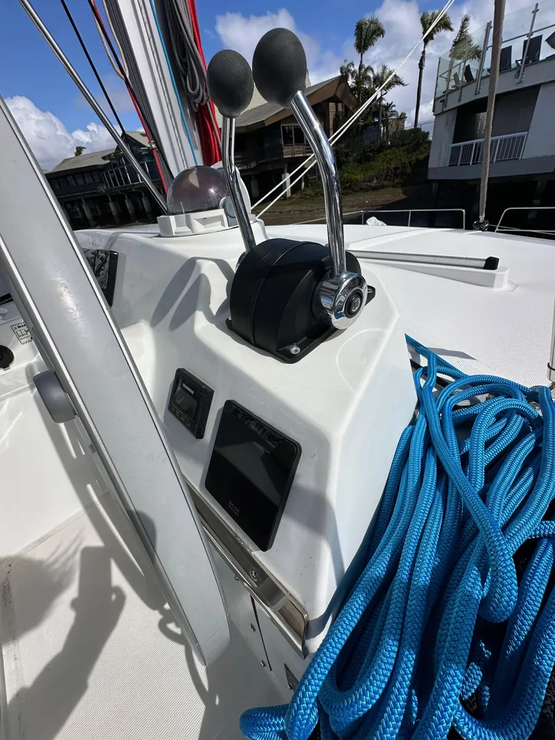 Slide: The Image of Control panel of a 2023 Bali 4.2 yacht with blue ropes. - 15