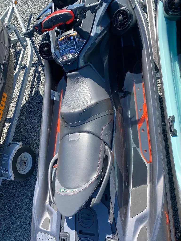 Slide: The Image of 2022 Sea-Doo RXT-X 300 Premium Triple Black jet ski, top view. - 6