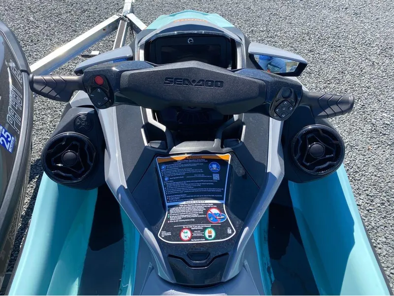 Slide: The Image of 2022 Sea-Doo RXT-X 300 Premium, black, with sound system, top view of handlebars. - 7