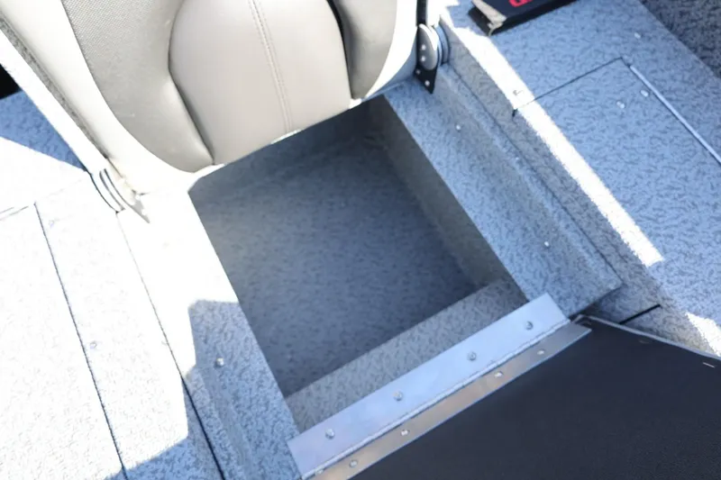 Slide: The Image of 2025 Lund 1875 Impact XS Sport boat interior storage compartment. - 22
