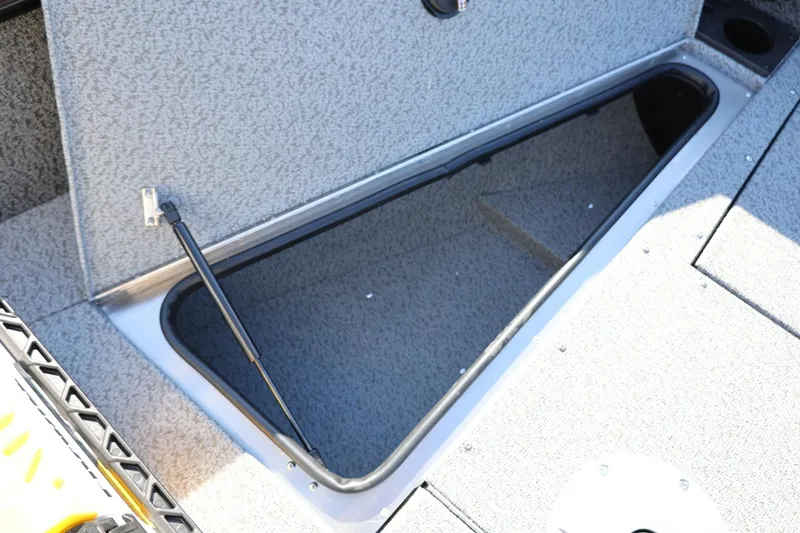 Slide: The Image of Open storage compartment in 2025 Lund 1875 Impact XS Sport boat. - 31