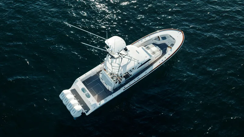 Slide: The Image of Aerial view of 2023 Front Runner 47 boat cruising on open water. - 15
