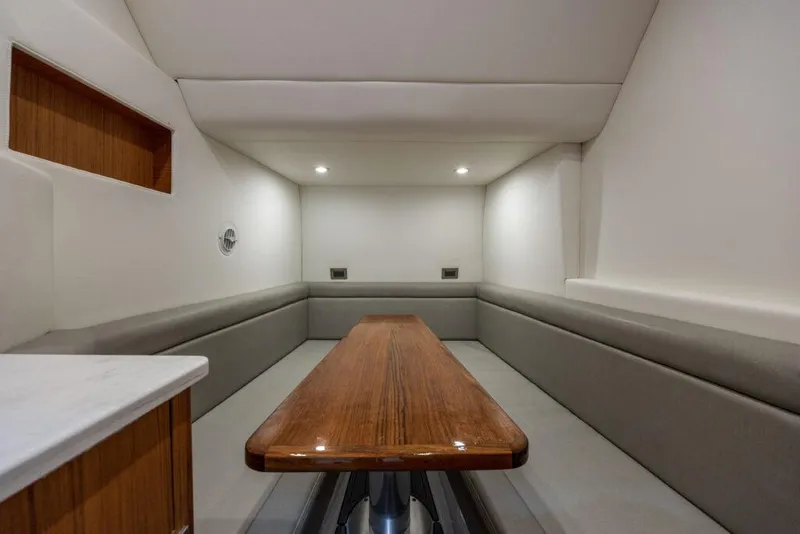 Slide: The Image of Interior of 2023 Front Runner 47 yacht with modern kitchen and seating area. - 25