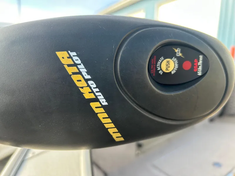Slide: The Image of Minn Kota AutoPilot control on 2002 Lund Pro Angler 16 boat. - 12