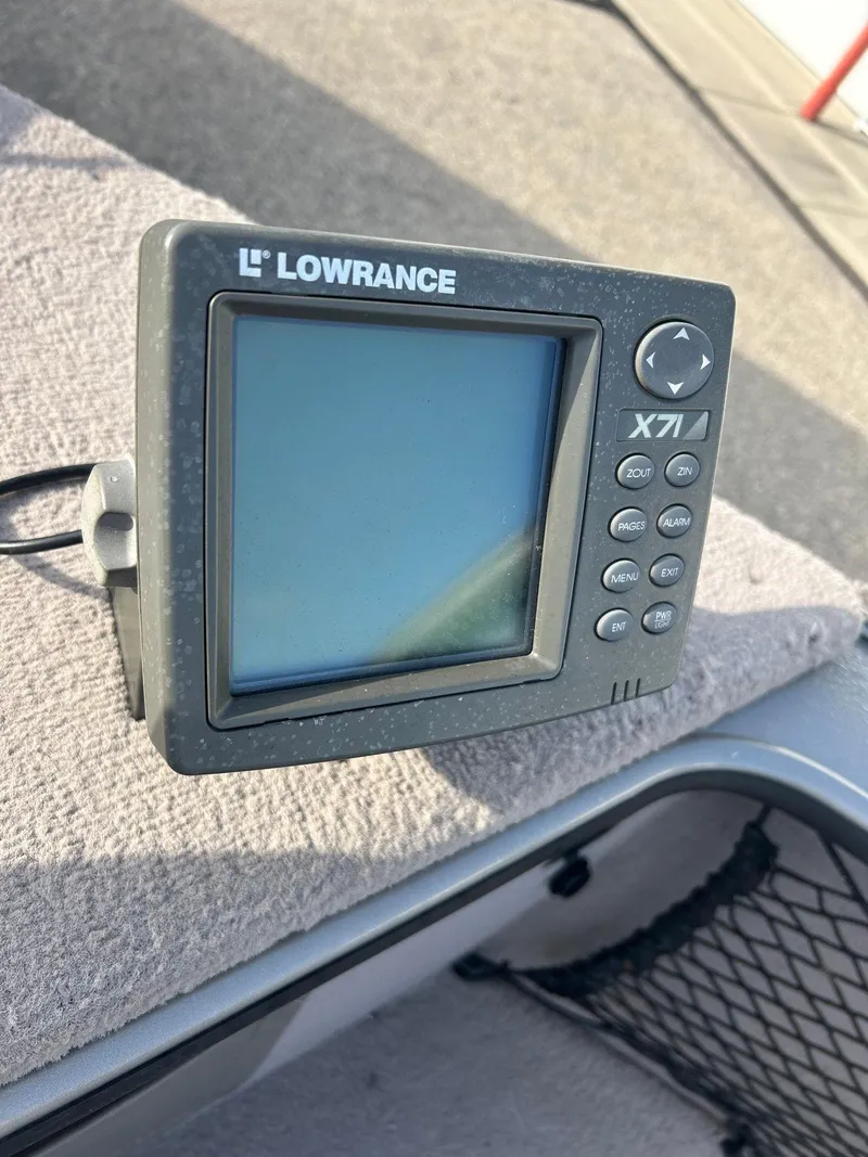 Slide: The Image of Lowrance X71 fish finder on 2002 Lund Pro Angler 16 boat. - 13