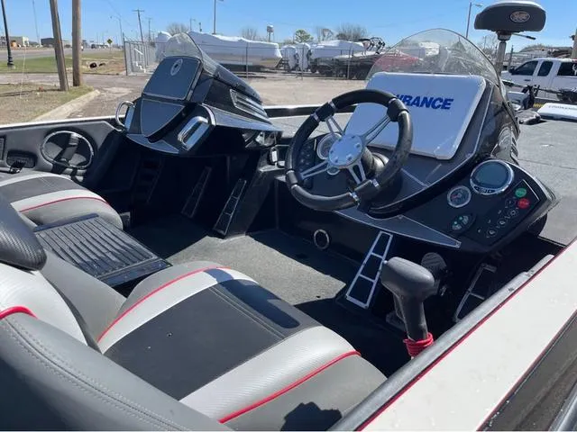 Slide: The Image of 2015 Ranger Z521C boat cockpit with dual consoles and steering wheel. - 7