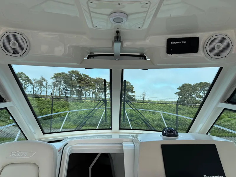 Slide: The Image of Interior view of 2022 Boston Whaler 285 Conquest boat with Raymarine electronics. - 15