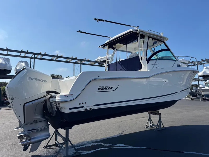 Slide: The Image of 2022 Boston Whaler 285 Conquest boat with Mercury engine on display. - 3