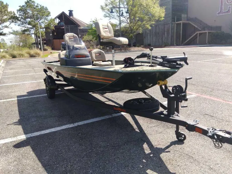 Slide: The Image of 2025 Tracker Bass Tracker Classic Limited boat on trailer in parking lot. - 6