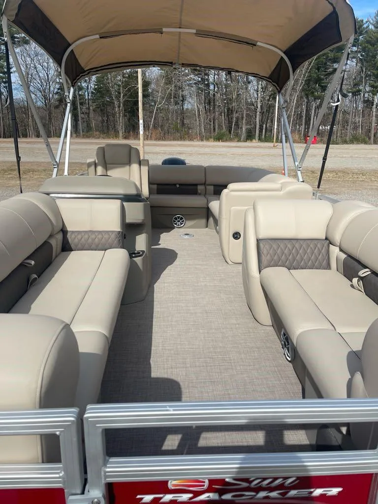 Slide: The Image of 2025 Sun Tracker Party Barge 20 DLX pontoon boat with spacious seating and canopy. - 6