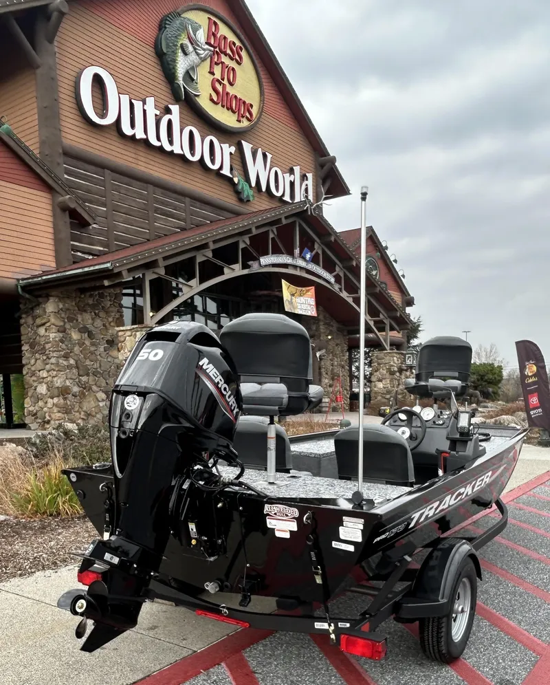 Slide: The Image of 2025 Tracker Pro 170 boat outside Bass Pro Shops Outdoor World. - 2