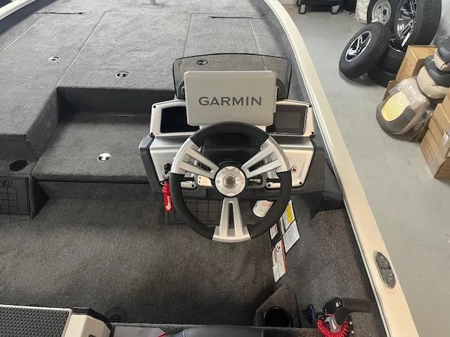 Slide: The Image of Steering console of 2025 Tracker Savage 215 boat with Garmin navigation system. - 3