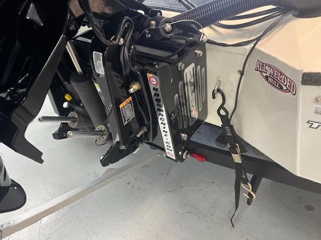 Slide: The Image of 2025 Tracker Savage 215 boat engine mount and hull detail. - 4