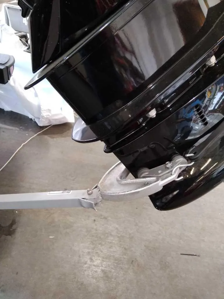 Slide: The Image of 2025 Tahoe 2150 CC boat engine close-up in a garage setting. - 6