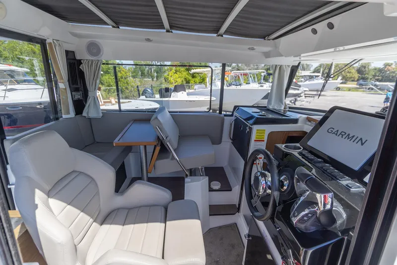 Slide: The Image of Interior of 2022 Jeanneau NC Sport 895 boat with Garmin navigation system. - 22