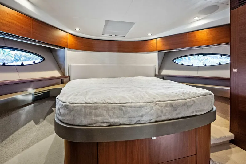 Slide: The Image of Luxurious cabin interior of 2019 Princess 43 Flybridge yacht with elegant wood finishes. - 17