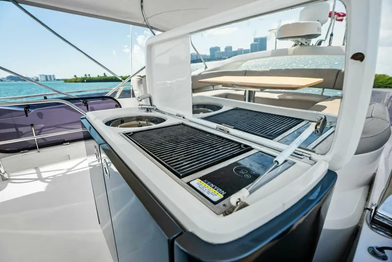 Slide: The Image of Outdoor kitchen on 2019 Princess 43 Flybridge yacht with grill and sink. - 32