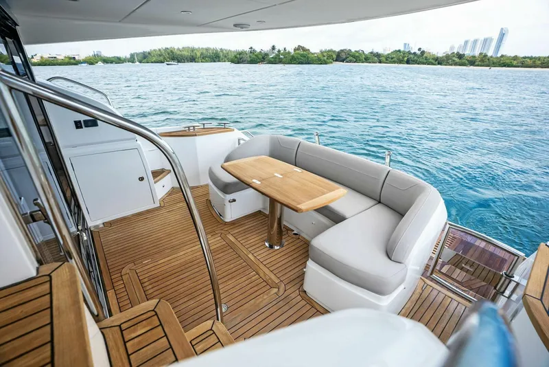 Slide: The Image of Luxurious 2019 Princess 43 Flybridge yacht with elegant teak deck and scenic water view. - 39